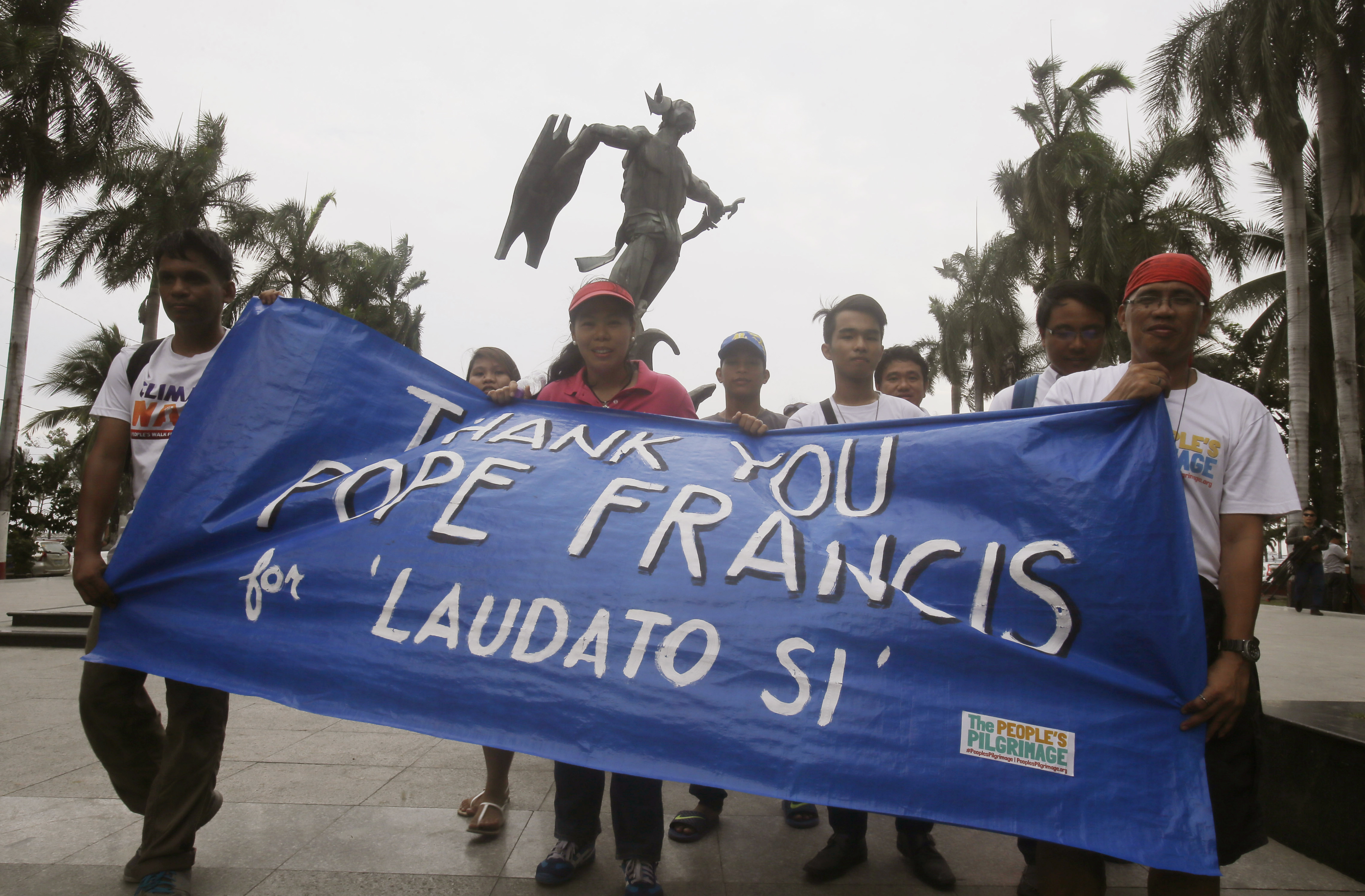 Enviromentalists march in support of Pope Francis’s encyclical. © Bullit Marquez/AP/Press Association Images