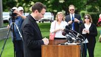 Auxiliary Bishop Andrew Cozzens announces the resignations of Archbishop John Nienstedt and Auxiliary Bishop Lee Anthony Piche during a news conference at the Archdiocese of Saint Paul & Minneapolis Chancery in St. Paul Minn., Monday, June 15, 2015.