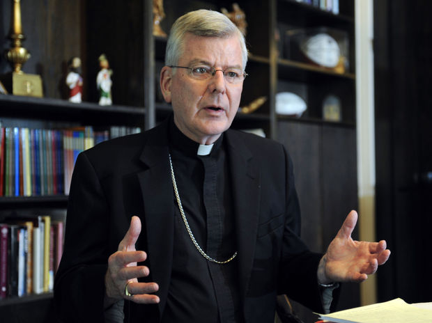 St. Paul-Minneapolis Archbishop John Nienstedt speaks last July at his office in St. Paul. On Monday, the Vatican said Pope Francis accepted the resignations of Nienstedt and Auxiliary Bishop Lee Anthony Piche after prosecutors charged the archdiocese with having failed to protect children from unspeakable harm from a pedophile priest. Nienstedt, interfered with an investigation by an outside law firm into allegations of his misconduct, Minnesota Public Radio reported Friday.