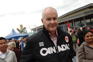 John Furlong: Claims article's allegations indirectly to blame for wife's driving death. Photo by Sergei Bachlakov via Shutterstock.