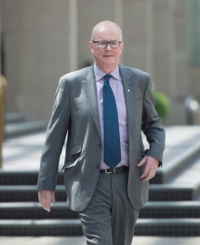Former Vancouver Olympics CEO John Furlong claims he was entitled to respond to an 'attack' by Laura Robinson. (Jonathan Hayward/Canadian Press)