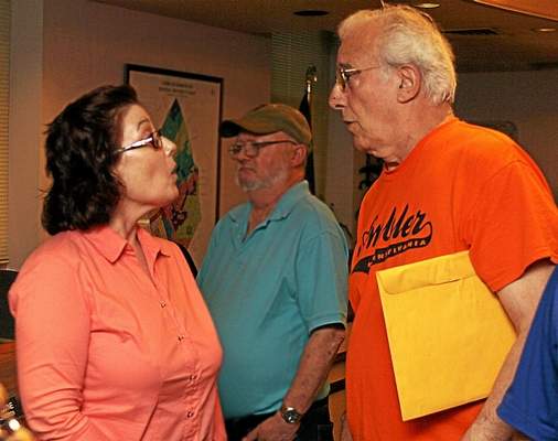 Karen Polesir, selected to fill the vacancy left by Richard Palumbo, and Ambler Borough Council President Sal Pasceri discuss her swearing-in at the next regular meeting. Bob Raines — Digital First Media