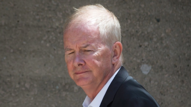 Former Vancouver Olympics CEO John Furlong arrives at B.C. Supreme Court after the lunch break during the second week of a defamation case against him. (Darryl Dyck/Canadian Press)