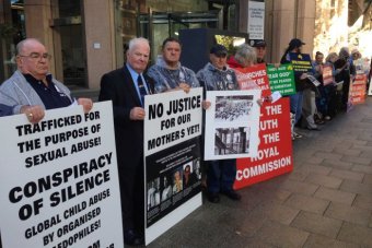 PHOTO: Supporters of those who suffered sexual abuse by the Christian Brothers outside the Royal Commission hearings in Perth. (ABC News: Jade Macmillan)
