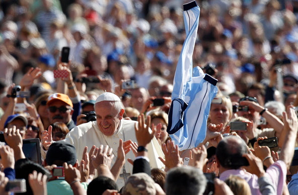 Pope Francis greeted the faithful in St. Peter's Square in September 2013.