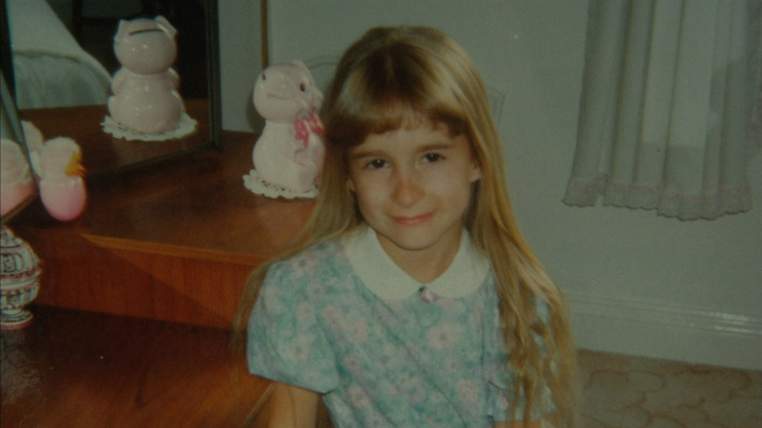 Esther Baker says she was abused by men as a child while police stood guard