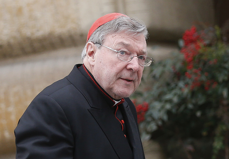 Australian Cardinal George Pell arrives for a meeting at the Synod Hall in the Vatican on March 6, 2013, ahead of the conclave that elected Pope Francis. Photo by REUTERS/Tony Gentile