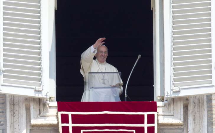 © AP Photo/Riccardo De Luca Pope Francis waves to the faithful as he arrives to recite the Angelus noon prayer from his studio window overlooking St. Peter's Square at the Vatican, Sunday, Aug. 9, 2015. Pope Francis said the detonation of…