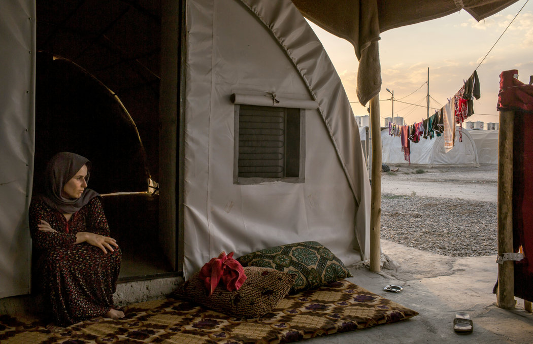 Aishan Ali Saleh, 40, at a refugee camp on the outskirts of Dohuk. She had lived in Kojo, one of the southernmost villages on Mount Sinjar, which was overrun by Islamic State fighters.