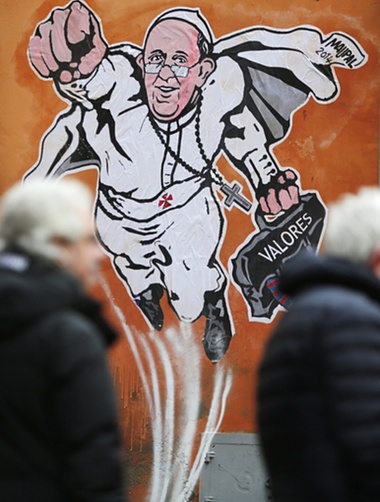 A mural of Pope Francis in downtown Rome near the Vatican. Photograph: Vincenzo Livieri/Demotix/Corbis