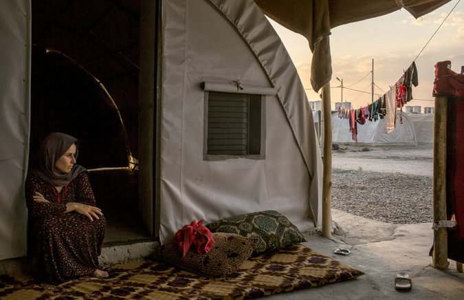 Aishan Ali Saleh, 40, at a refugee camp on the outskirts of Dohuk. She had lived in Kojo, one of the southernmost villages on Mount Sinjar, which was overrun by Islamic State fighters.
