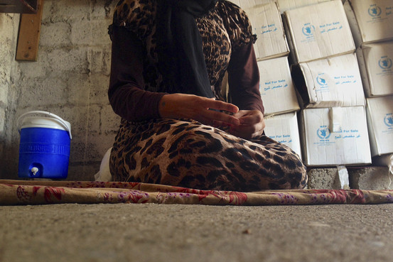 An October 2014 photo of a 15-year-old Yazidi girl captured by Islamic State and forcibly married to a militant in Syria, speaking to the Associated Press in Maqluba, near the Kurdish city of Dahuk, northwest of Baghdad. She escaped about three months earlier. Associated Press
