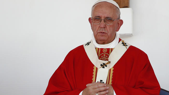 Pope Francis stands on the altar during a Mass in the Plaza of the Revolution, in Holguin, Cuba, Monday, Sept. 21, 2015.