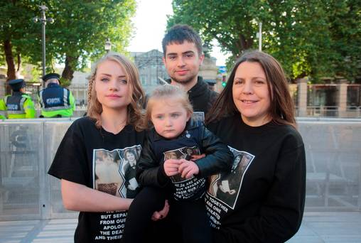 Members of the Collins Family & relatives of Angela Collins who spent 27 years in a Magdalene Laundry (L to R) Laura with her daughter Angel (3), Craig & there mother Mary all living in London protesting for the forgotten families of the victims of Institutional abuse in Magdalene laundries, Industrial Schools and Mother and Baby homes outside Leinster House, Dublin. Photo: Gareth Chaney Collins