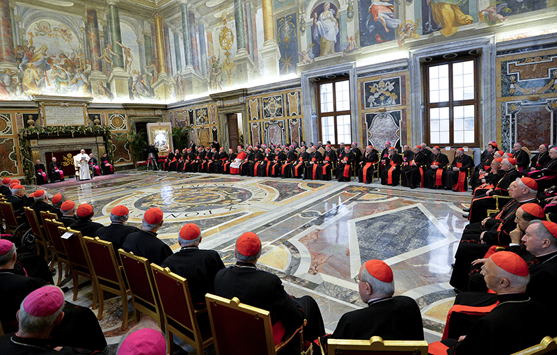 Pope Francis talks during an audience for Christmas greetings to the Curia in the Clementina hall at the Vatican on Dec. 22, 2014. Photo courtesy of REUTERS/Andreas Solaro/Pool *Editors: This photo may only be republished with RNS-POPE-CURIA, originally transmitted on Sept. 23, 2015.