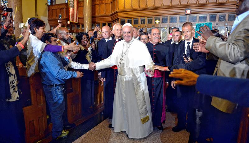 Pope Francis greets people on his arrival at St. Patrick's Church, in Washington, Thursday, Sept. 24, 2015. (Mike Theiler/Pool Photo via AP)
