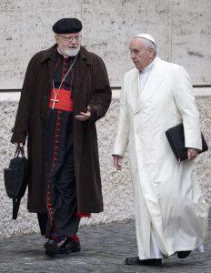In this Feb. 13, 2015 file photo, Pope Francis, right, talks with Cardinal Sean O’Malley, of Boston, as they arrive for a special consistory in the Synod Hall at the Vatican. (Andrew Medichini/AP/File)