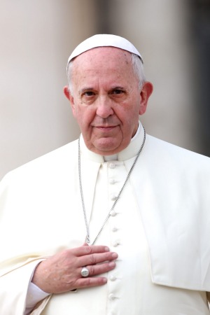 Pope Francis has been asked to introduce mandatory reporting laws about child sexual abuse. Photo: Franco Origlia
