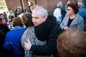 Anna Mattessich, a congregant at St. Margaret of Cortona Church in Little Ferry, hugs Reverend Kevin Carter after he gave a press conference to the media outside of Central Municipal Court in Hackensack on Tuesday, Oct. 6, 2015.