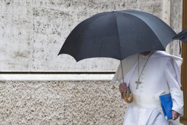 Pope Francis arrives for the afternoon session of the Synod of bishops, at the Vatican, Saturday, Oct. 10, 2015. Pope Francis directed the attention of the world's bishops to real-world crises Friday by denouncing the escalation of conflicts in Syria and Iraq and urging greater diplomacy to end the "humanitarian crisis of enormous proportions." (AP Photo/Andrew Medichini) Photo Credit: AP