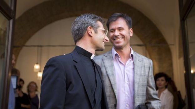 Krzysztof Charamsa (left) - seen here with his partner Eduard - caused a stir when he revealed he was gay shortly before the meeting started