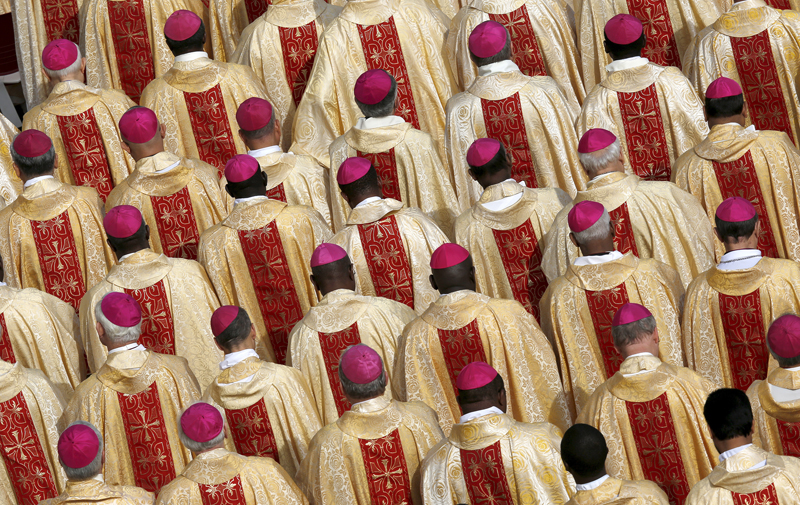 Bishops are seen in attendance as Pope Francis leads the mass for a canonization in Saint Peter’s Square at the Vatican on October 18, 2015. Photo courtesy of REUTERS/Alessandro Bianchi *Editors: This photo may only be republished with RNS-AMERICANS-SYNOD, originally transmitted on Oct. 19, 2015.