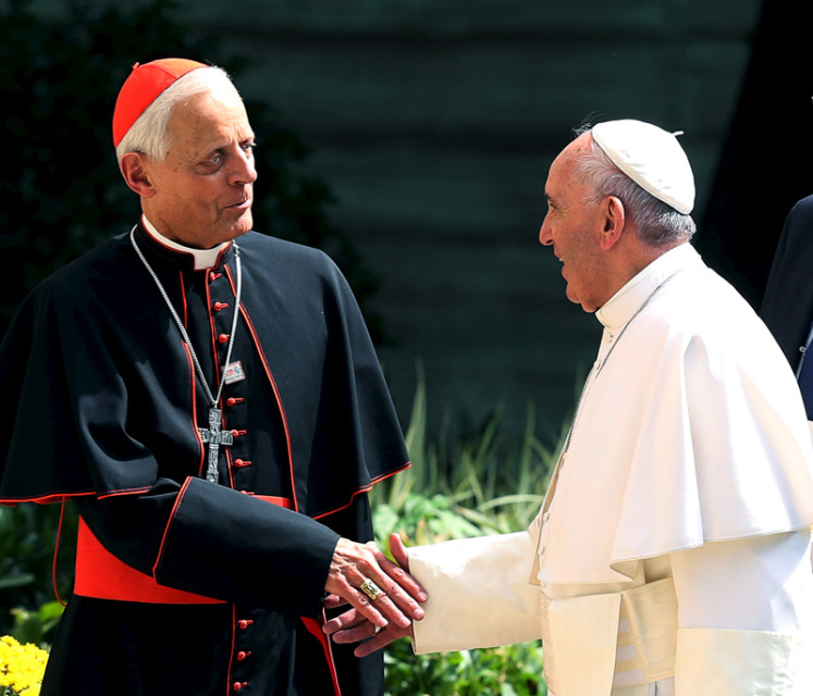 Pope Francis greets the Archbishop of Washington, Cardinal Donald Wuerl, upon returning to the Vatican Embassy in Washington on day three of his first visit to the United States on September 24, 2015. Photo courtesy of REUTERS/Gary Cameron