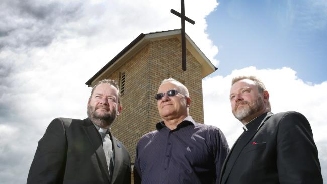 Child sexual abuse survivor Malcolm Angus with Father Micheal Davies (L) and Father Rod Bower (R) at St Luke’s Church Woy Woy. Picture: Mark Scott
