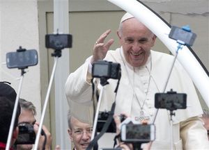 Pope Francis arrives for his weekly general audience in St. Peter's Square at the Vatican, Wednesday, Oct. 28, 2015. (AP Photo/Alessandra Tarantino)