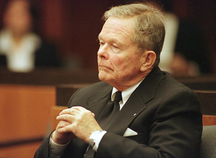 Catholic priest John Geoghan listens in court in 2001.
