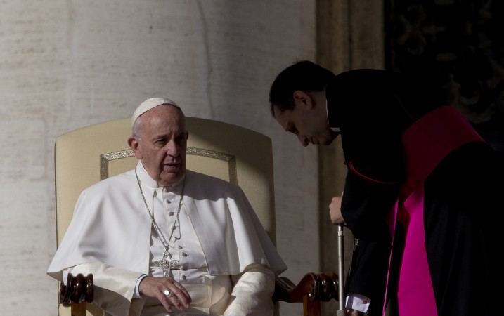 Pope Francis sat during his weekly general audience in St. Peter's Square at the Vatican, Wednesday, Nov. 4, 2015. (AP Photo/Alessandra Tarantino)
