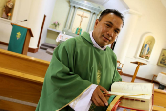 PHOTO: Catholic priest, Father Neru Leuea, in 2012. (Daily Advertiser)