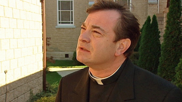 The Crown alleges Robert Couture stole from collection plates when he was a priest at Ste. Anne Parish in Tecumseh, Ont. Couture's trial opened in Windsor, Ont. (CBC File Photo)