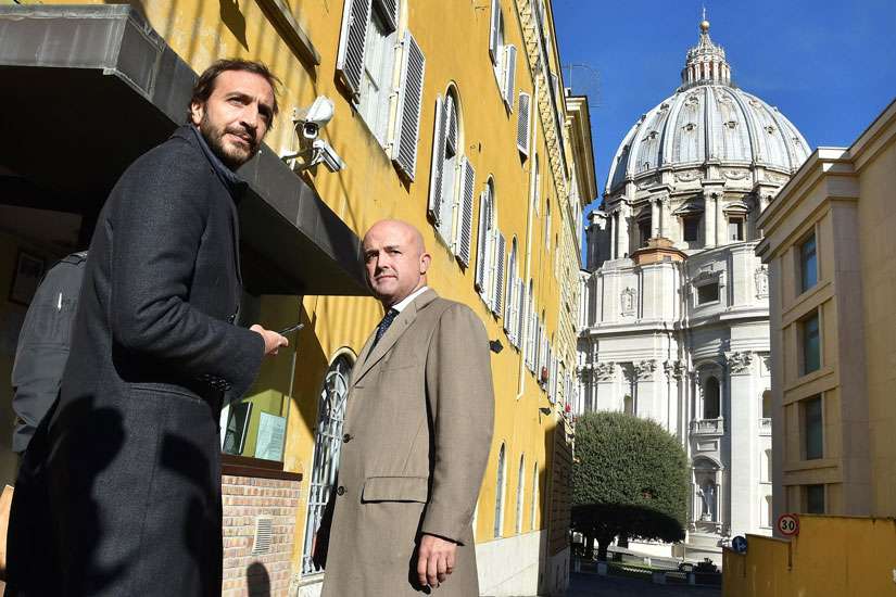 Italian journalists and authors Emiliano Fittipaldi and Gianluigi Nuzzi arrive for the first day of the 'VatiLeaks' case at the Vatican Nov. 24. All five people accused of involvement in leaking and publishing confidential documents about Vatican finances were present at the opening of the criminal trial in a Vatican courtroom.