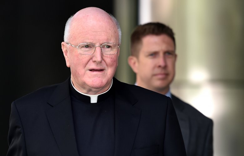 Melbourne Archbishop Denis Hart arrives at the royal commission hearing in Melbourne on Tuesday.