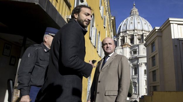 Emiliano Fittipaldi (centre) and Gianluigi Nuzzi (right) are on trial at the Vatican