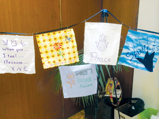 Conference participants created prayer flags with healing messages.