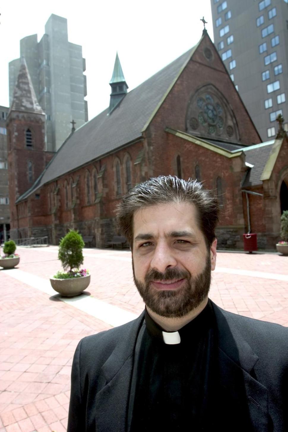 The Rev. Peter Miqueli is accused of looting the parish coffers by breaking Archdioceses rules governing donations and gifts.