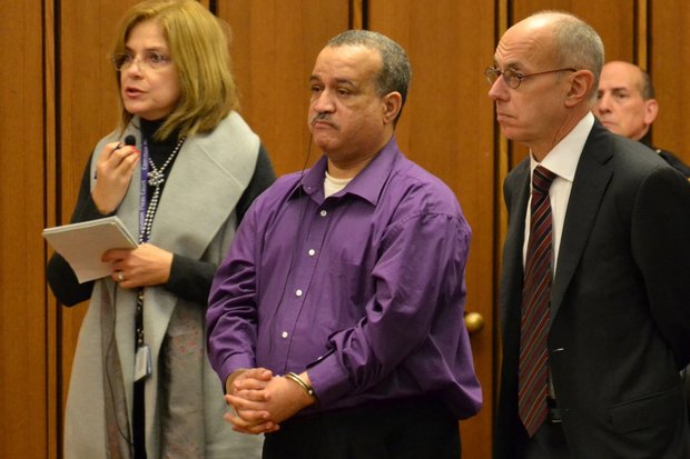 Former pastor Ubaldo Ocasio, center, was sentenced to life in prison Thursday after a jury convicted him of sexually abusing girls in his West Side congregation. a plea deal Tuesday that would have put him in prison for 29 years. Ocasio is shown here with his defense attorney, Jaye Schlachet, and an interpreter. (Cory Shaffer, cleveland.com)