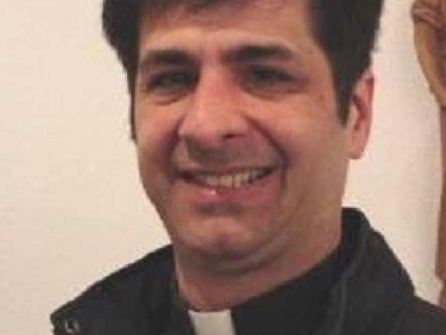 Reverend Peter Miqueli allegedly stole money to pay for sex slave.Source:Supplied