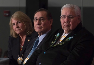 Commissioner Justice Murray Sinclair, Commissioner Chief Wilton Littlechild and Commissioner Marie Wilson (right to left) listen to a speaker as the final report of the Truth and Reconciliation commission is released, Tuesday Dec. 15, 2015 in Ottawa. (Adrian Wyld/Canadian Press)