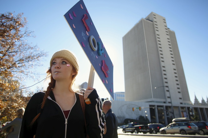 A young Mormon protests the church’s position on same-sex marriage.
