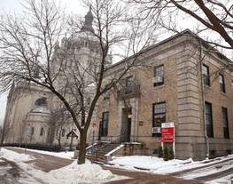 244 DAYTON: The building, dating to 1922, is on the National Register of Historic Places. It houses the Catholic Spirit newspaper and other offices.