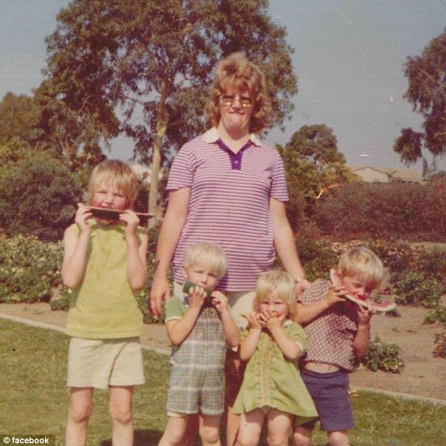 Ruth (the smallest child in the middle) with her mom Kathy and some of her older siblings