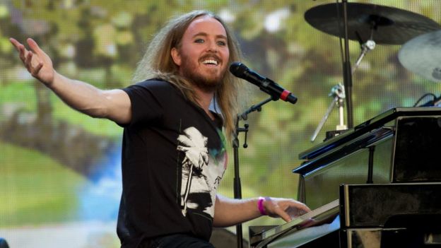 Australian comedian Tim Minchin released a scathing song that dared the cardinal to return to Australia and sue him