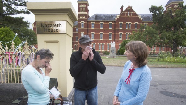 John Skewes joins Wendy Dyckhoff, left, and Gabrielle Short in their vigil outside Nazareth House, in Ballarat. Photo: Simon O'Dwyer