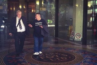 PHOTO: Former Catholic priest Robert Flaherty (left), 72, has been granted bail while he appeals child sex convictions. (ABC News: Stephanie Dalzell)