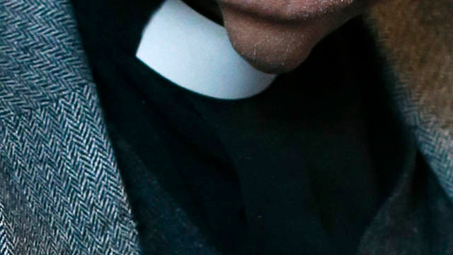 File photo of a priest collar (Photo credit: PATRICK KOVARIK/AFP/Getty Images)