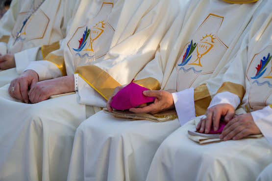 Philippine bishops at the International Eucharistic Congress in Cebu in January. The church has been dealing with the issue of sex abuse by priests for over 10 years, says the bishops' conference. (Photo by Mark Saludes)
