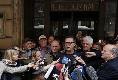David Ridsdale, who was sexually abused by his uncle, Father Gerald Ridsdale, stands next to fellow sexual abuse survivors Andrew Collins, Phil Nagle and others as he speaks with media in front of the Hotel Quirinale in Rome March 3. Ause survivors met with Australian Cardinal George Pell after his testimony via video link from the hotel to Australia's Royal Commission Into Institutional Responses to Child Sexual Abuse in Sydney. (CNS photo/Paul Haring)
